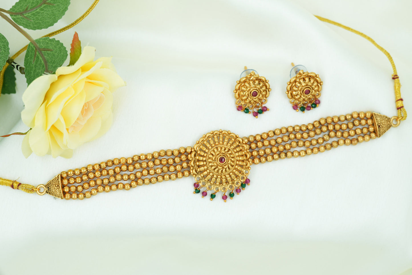 Gold necklace set with matching earrings